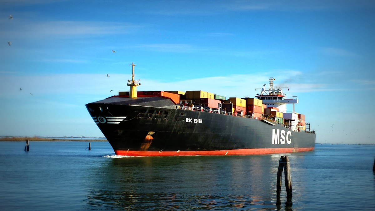 Cargo ship and containers at port