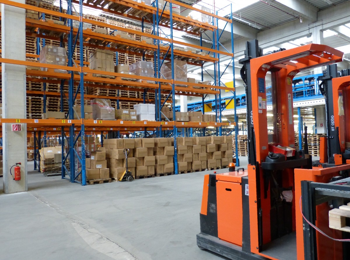 Warehouse and forklift handling cargo